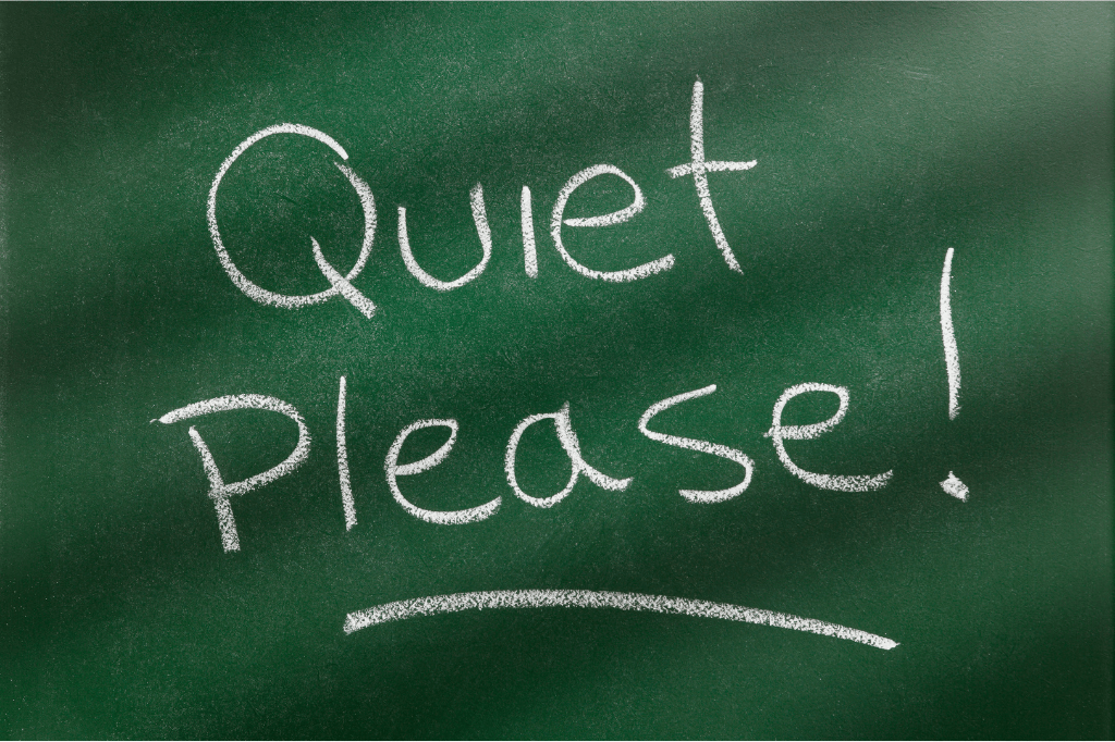 Quiet please written in chalk.